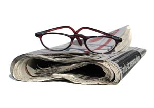 Newspapers and glasses