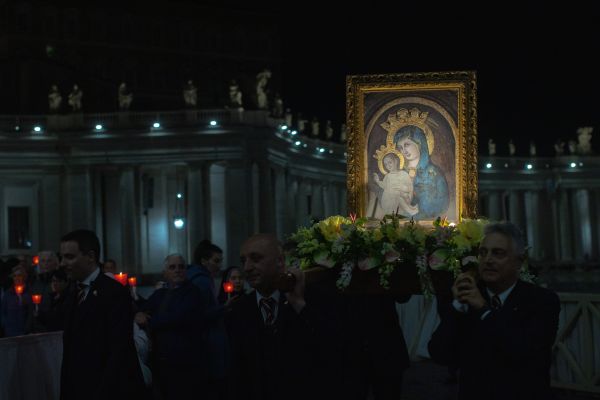 St. Peter’s Square was illuminated by candlelight the night of Saturday, May 20, 2023, as pilgrims prayed the rosary in a procession in honor of the Blessed Virgin Mary. Credit: Daniel Ibañez/CNA