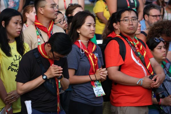 Pilgrims kneel in adoration at a World Youth Day event in Lisbon, Portugal, Aug. 2, 2023. The event was hosted by the U.S. bishops’ conference and featured a talk by Bishop Robert Barron culminating in a eucharistic procession and Holy Hour. Credit: Nuria Chiccon/EWTN News