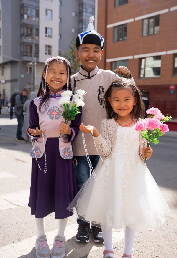 Schoolchildren eagerly wait for the pope’s arrival outside of the apostolic prefecture on Sept. 1, 2023, in Ulaanbaatar, Mongolia, where Pope Francis will be staying for the duration of his four-day visit to the country. Credit: Colm Flynn/EWTN News
