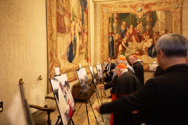Viewers walk through a photo exhibit chronicling definitive moments both for the local Church in Korea and in its bilateral relationship with the Holy See at a reception following a Mass on the 60th anniversary of diplomatic relations between the two states. Credit: Elizabeth Alva/EWTN