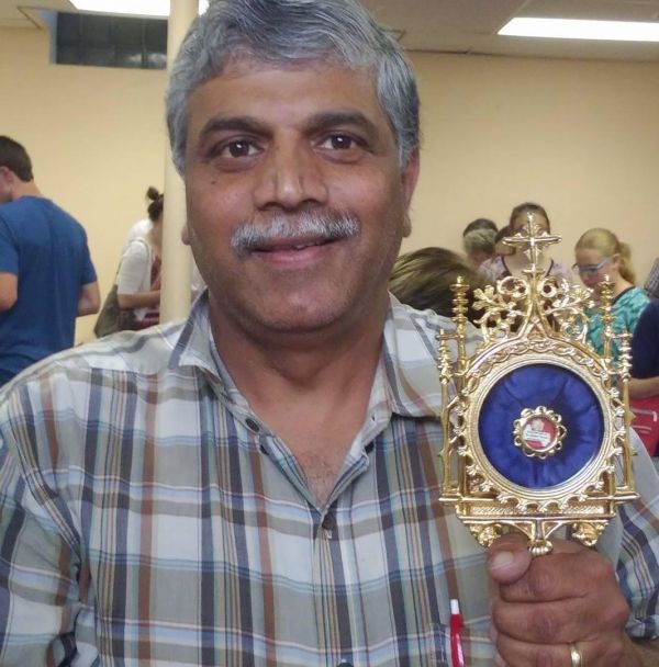 Patrick Norton at a conference in Wisconsin with a relic of Mother Teresa six years ago. Credit: Photo courtesy of Patrick Norton