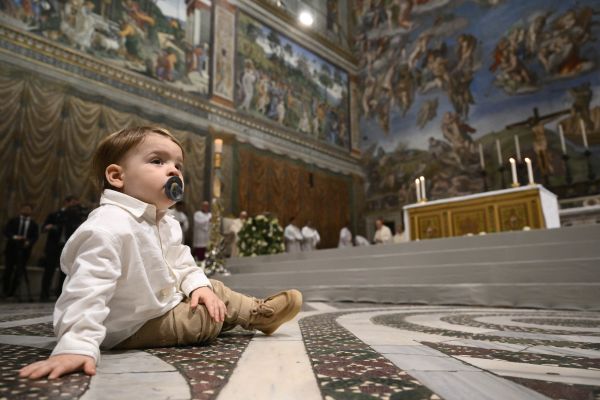 In his homily, Pope Francis encouraged parents not to worry if their children cry or fuss during Mass. Vatican Media