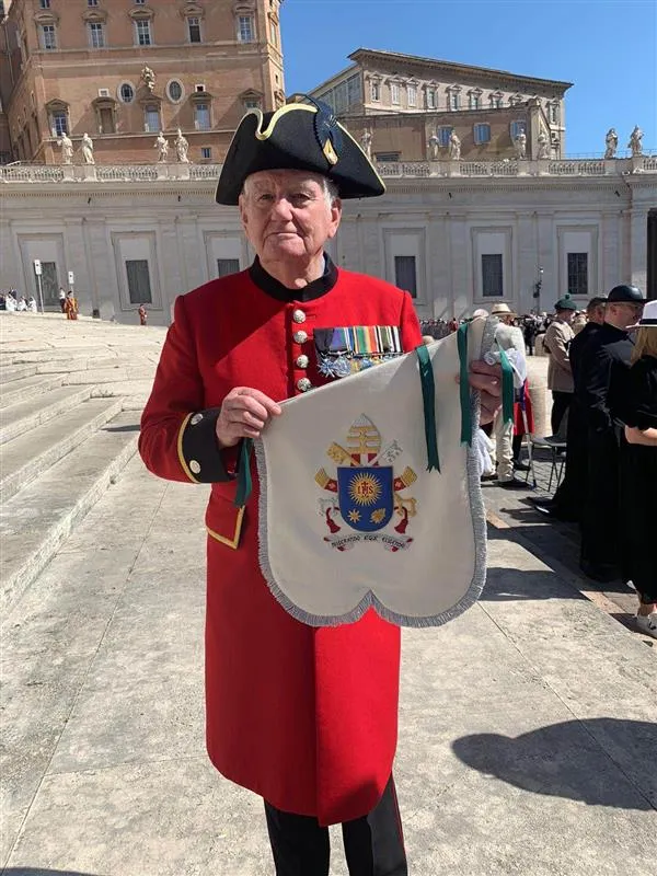 A soldier displays a coat of arms during the Royal Irish Regiment and 38th (Irish) Brigade's performance for Pope Francis at the Vatican on June 12, 2024. Credit: U.K. Embassy to the Holy See
