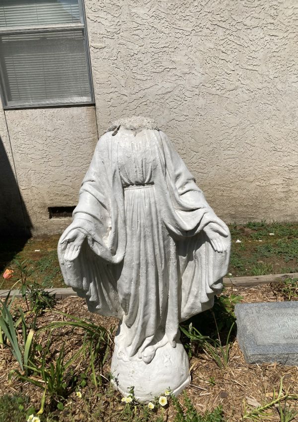 A vandalized statue of Mary, the Mother of God, at St. Leo Parish in Hartford, Arkansas, July 2024. Fr. Joseph Chan