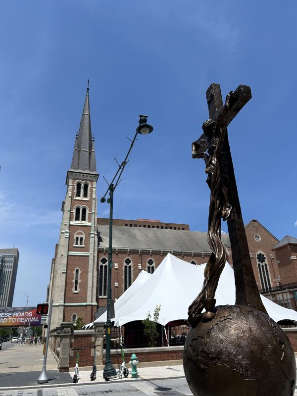 St. John the Evangelist Catholic Church is located across the street from the Indiana Convention Center where the National Eucharistic Congress took place July 17-21, 2024. The sculpture in the foreground was created by Canadian artist Timothy Schmalz. Credit: Zelda Caldwell/CNA