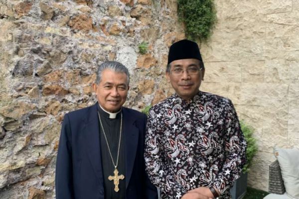 Sheikh Yahya Cholil Staquf with Archbishop Agustinus Agus of Pontianak. Courtney Mares/CNA file image