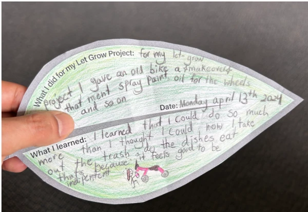 A leaf with an independence assignment a student wrote about and reflected on as part of the Let Grow movement. Credit: Courtesy of Let Grow