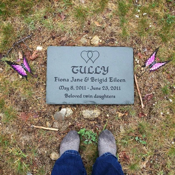 The gravestone of Eileen Tully’s twins, Fiona Jane and Brigid Eileen, who died in 2011. Credit: Photo by Eileen Tully/Sursum Corda