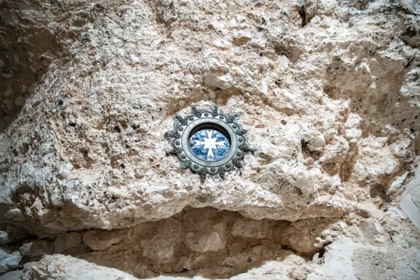 A cross inside the Milk Grotto in Bethlehem marks the spot where an angel appeared to Joseph and told him to flee to Egypt (cf. Mt 2:13-14). Credit: Marinella Bandini