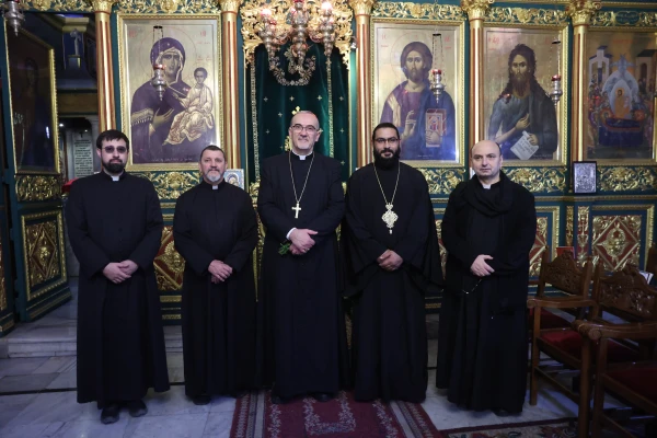 The Latin patriarch of Jerusalem, Cardinal Pierbattista Pizzaballa (center), during his visit to the Orthodox Church of St. Porphyrius in Gaza on Dec. 22, 2024. To his left: the chancellor of the patriarchate, Don Davide Meli, and the provincial of the Institute of the Incarnate Word, Father Carlos Ferrero. To his right, an Orthodox priest and the parish priest of the Latin church of Gaza, Father Gabriel Romanelli. Credit: Photo courtesy of the Latin Patriarchate of Jerusalem