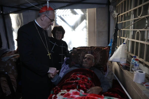 The Latin patriarch of Jerusalem, Cardinal Pierbattista Pizzaballa, visits the sick refugees at the Latin parish compound of the Holy Family during his visit to Gaza on Dec. 22, 2024. Credit: Photo courtesy of the Latin Patriarchate of Jerusalem