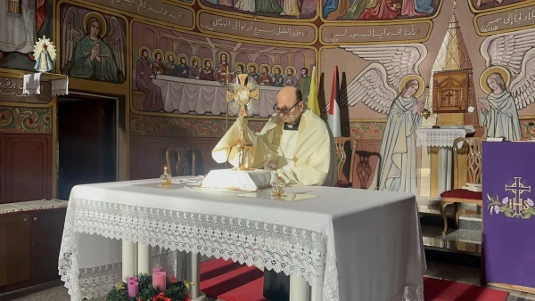 Eucharistic adoration at the Holy Family Parish in Gaza, led by the parish priest, Father Gabriel Romanelli. Credit: Photo courtesy of Father Gabriel Romanelli