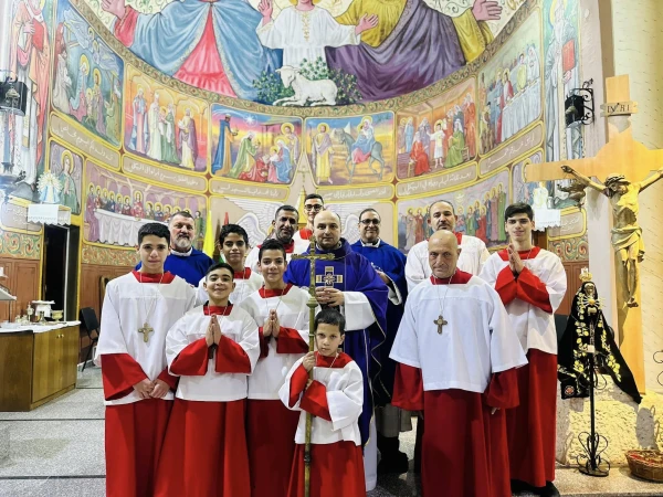 The priests of the Latin Parish of the Holy Family in Gaza with the group of altar servers in December 2024. Credit: Photo courtesy of Father Gabriel Romanelli