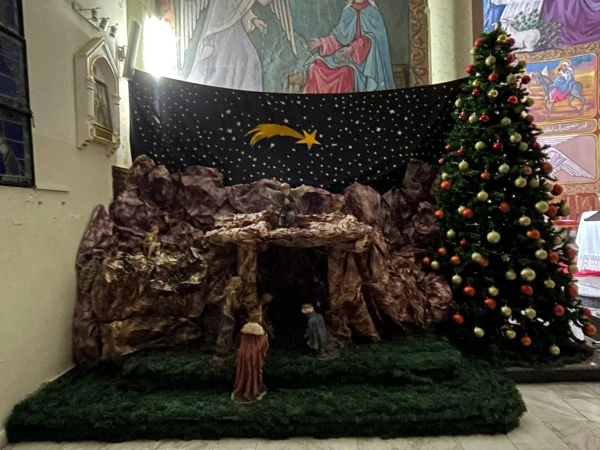 The Nativity scene and Christmas tree set up in the Church of the Holy Family in Gaza, December 2024. Credit: Photo courtesy of Father Gabriel Romanelli