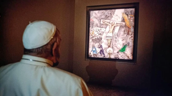 Pope Francis visits Marc Chagall’s painting “White Crucifixion” at Palazzo Cipolla in Rome on the feast of the Immaculate Conception, Dec. 8, 2024. Vatican Media