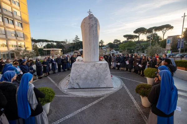 Religious sisters and dozens of faithful gather around the statue of St. John Paul II at Gemelli Hospital to pray the rosary for Pope Francis on Saturday afternoon, Feb. 22, 2025. Credit: Daniel Ibáñez/CNA