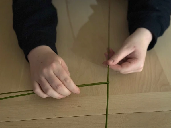Making a St. Brigid cross. Credit: Joe Passmore