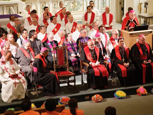 Faith leaders listen as Bishop Mark Seitz speaks at a rally for immigrants and refugees at the Diocese of El Paso, Texas, on Monday, March 24, 2025. Credit: Father Miguel Briseño, OFM