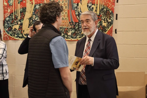 Scott Hahn speaks to audience members after his April 4, 2025, visit and lecture sponsored by the Harvard Catholic Forum at Harvard University. Credit: Photo courtesy of Harvard Catholic Forum