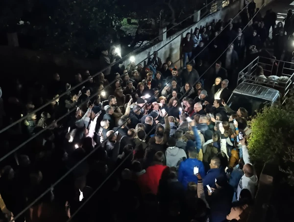Friends and family gather around Deacon Johnny Fouad Dawoud as he returns home on March 2, 2025, after a decade in captivity. Credit: Photo courtesy of Deacon Johnny Fouad Dawoud