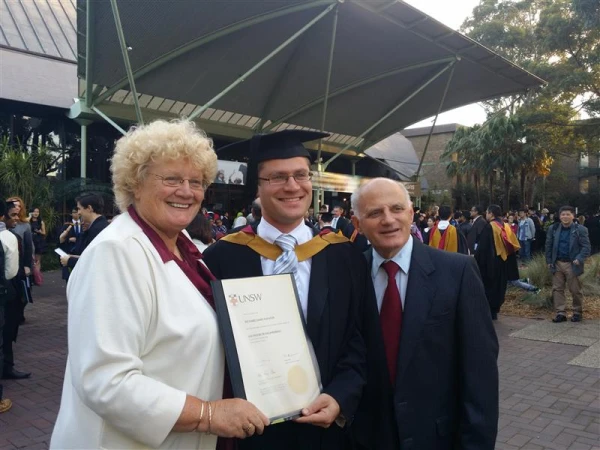 Richard Sofatzis with his parents after he graduated with a bachelor's degree in Electrical Engineering from the University of New South Wales, Sydney. Courtesy of Joseph Lovskiy