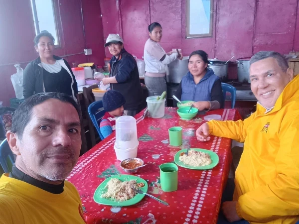 Fabrizio Caciano with Emergency Missions members in charge of a popular dining room on a hill in Lima, Peru. Credit: Photo courtesy of Fabrizio Caciano