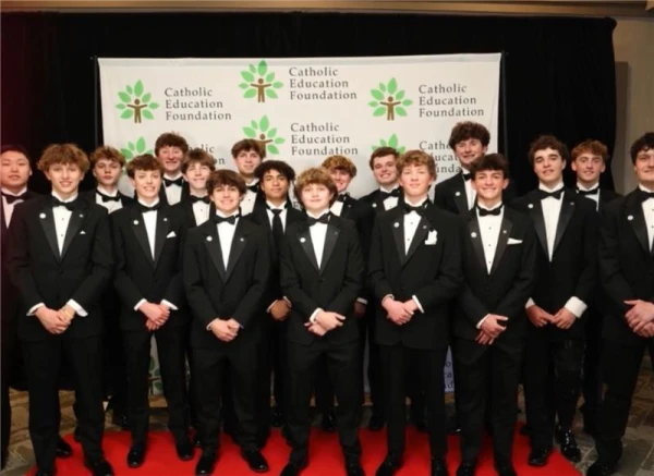 St. Xavier High School students were the ushers for the 35th annual Salute to Catholic School Alumni dinner in downtown Louisville at Galt House Hotel on March 18, 2025. The event celebrates honorees whose lives are enriched by Catholic education and faith. Credit: Catholic Education Foundation