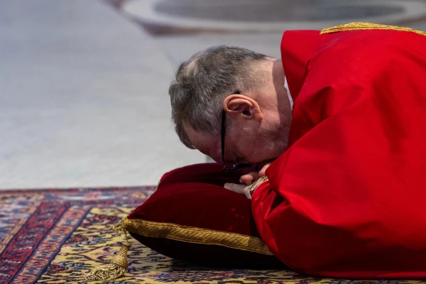 Cardinal Claudio Gugerotti lies prostrate at the start of the Liturgy of the Lord’s Passion on Good Friday, April 18, 2025, in St. Peter’s Basilica at the Vatican. Credit: Daniel Ibañez/CNA