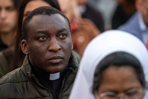 A priest prays the rosary for Pope Francis in St. Peter’s Square at the Vatican, Monday, April 21, 2025. Credit: Daniel Ibáñez/CNA