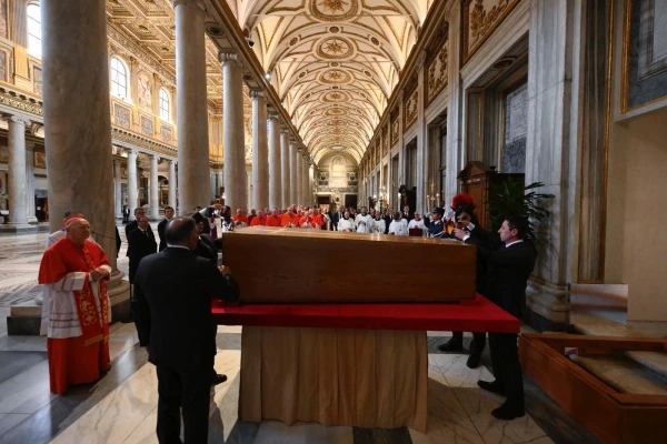 Vatican officials prepare Pope Francis' coffin as Cardinal Kevin Farrell, camerlengo (left), observes during the private burial ceremony at the Basilica of St. Mary Major, April 26, 2025. Credit: Vatican Media