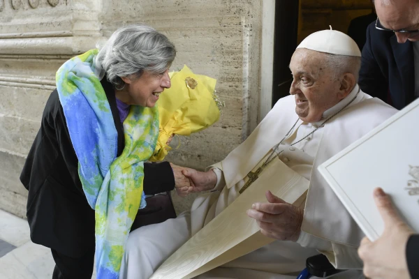 Pope Francis greets Carmela Mancuso, the renowned "lady with the yellow flowers," on April 20, 2025. Credit: Vatican Media