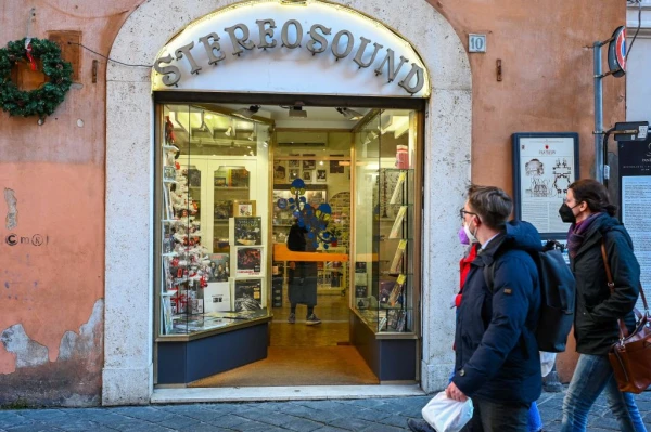 Pedestrians walk past the Stereosound record shop, located a few steps from the Pantheon in Rome, on Jan. 12, 2022, a day after the pope's visit. Pope Francis, a great lover of classical music, was caught leaving the record shop, which is owned by friends of his, in central Rome on Jan. 11, 2022, to bless it after its renovation, for which he received a gift. Before being elected pontiff in 2013, the pope stayed in a residence for religious near the Pantheon and used to buy classical music records when he was a simple bishop. Credit: VINCENZO PINTO/AFP via Getty Images