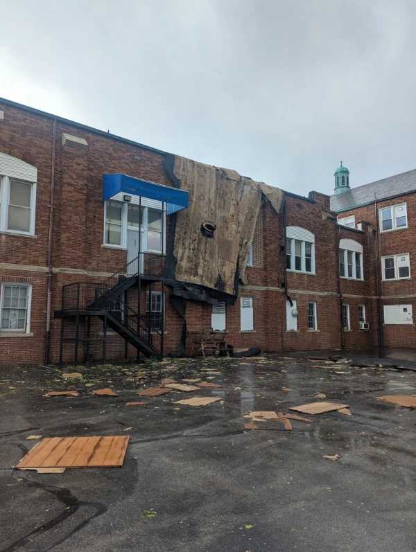 The ripped-off roof of the school gym at St. Peter Claver Parish in St. Louis. Credit: Photo courtesy of Father Scott Scheiderer