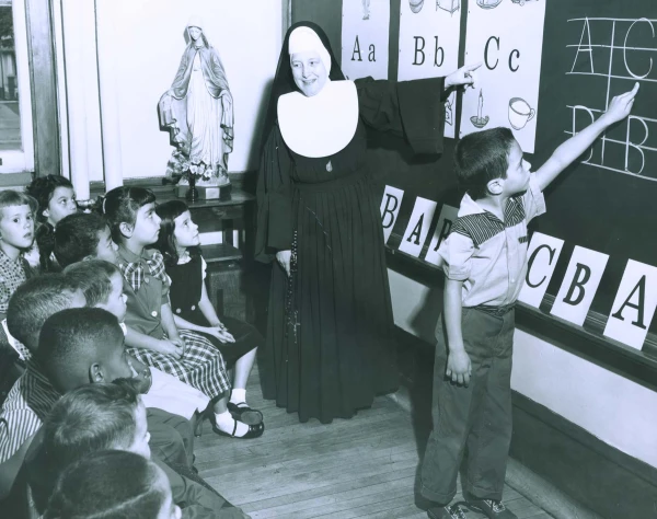 A Sister of the Humility of Mary teaches grade school. Credit: Courtesy of the Sisters of the Humility of Mary archives
