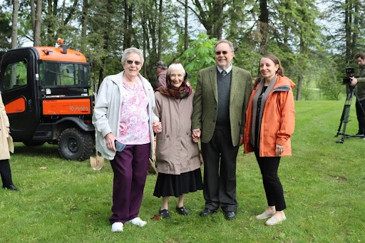 (Left to right) Sister Vivien Linkhauer, Sister Gemma Del Duca, James Paharik, and Jen Jones, professor of marketing and communications at Seton Hill, attend the planting of the Anne Frank Tree at Seton Hill University in May 2025. Credit: Photo courtesy of Seton Hill University