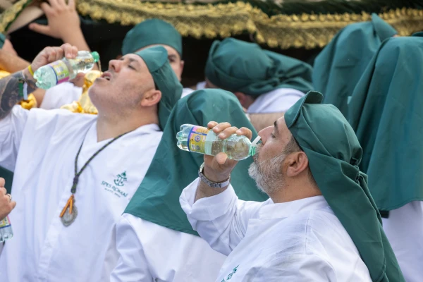 Members of a confraternity enjoy a drink during the grand procession of the Jubilee of Confraternities in Rome, Saturday, May 17, 2025. Credit: Daniel Ibáñez/CNA