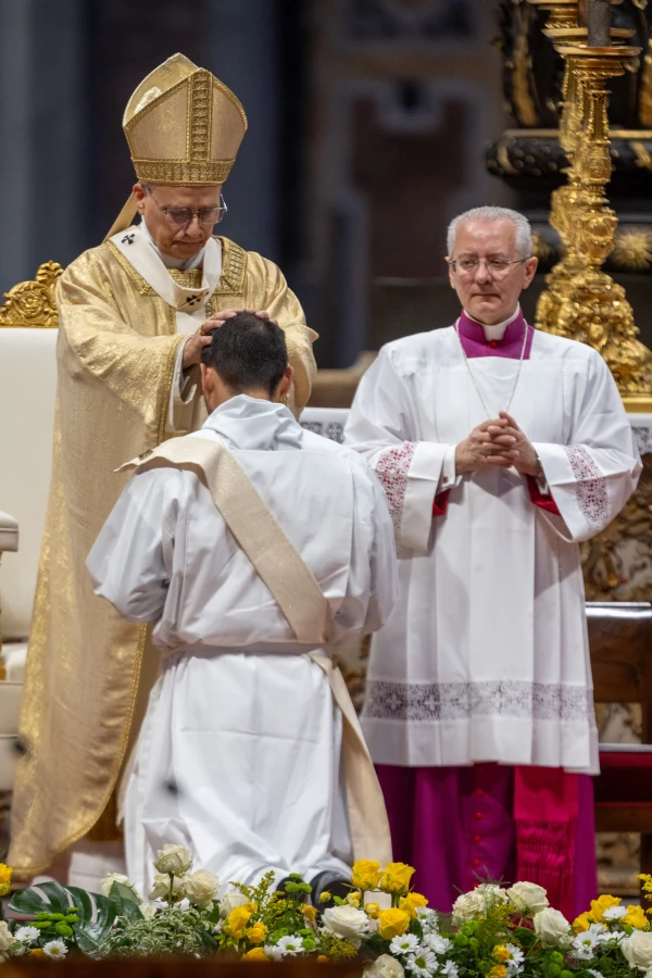 Pope Leo XIV lays hands on one of 11 men during priestly ordinations at St. Peter's Basilica on May 31, 2025. Credit: Daniel Ibáñez/CNA