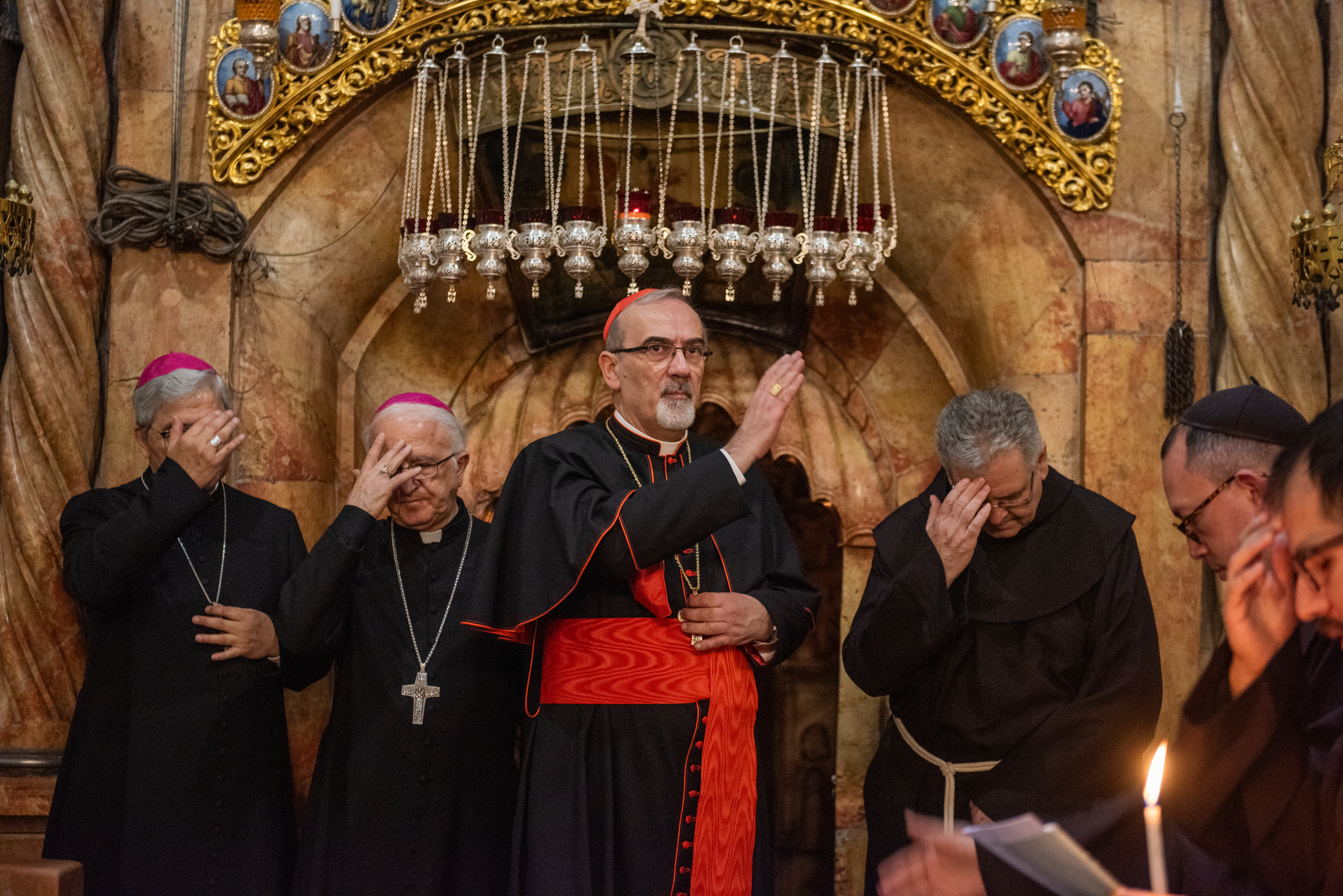 Cardinal Pierbattista Pizzaballa, Latin patriarch of Jerusalem, imparts the blessing in front of the aedicule of the Holy Sepulcher on Friday, Oct. 27, 2023, where Jesus’ tomb is venerated. Here ends the Way of the Cross that the Franciscan friars celebrate every Friday. - Credit: Marinella Bandini