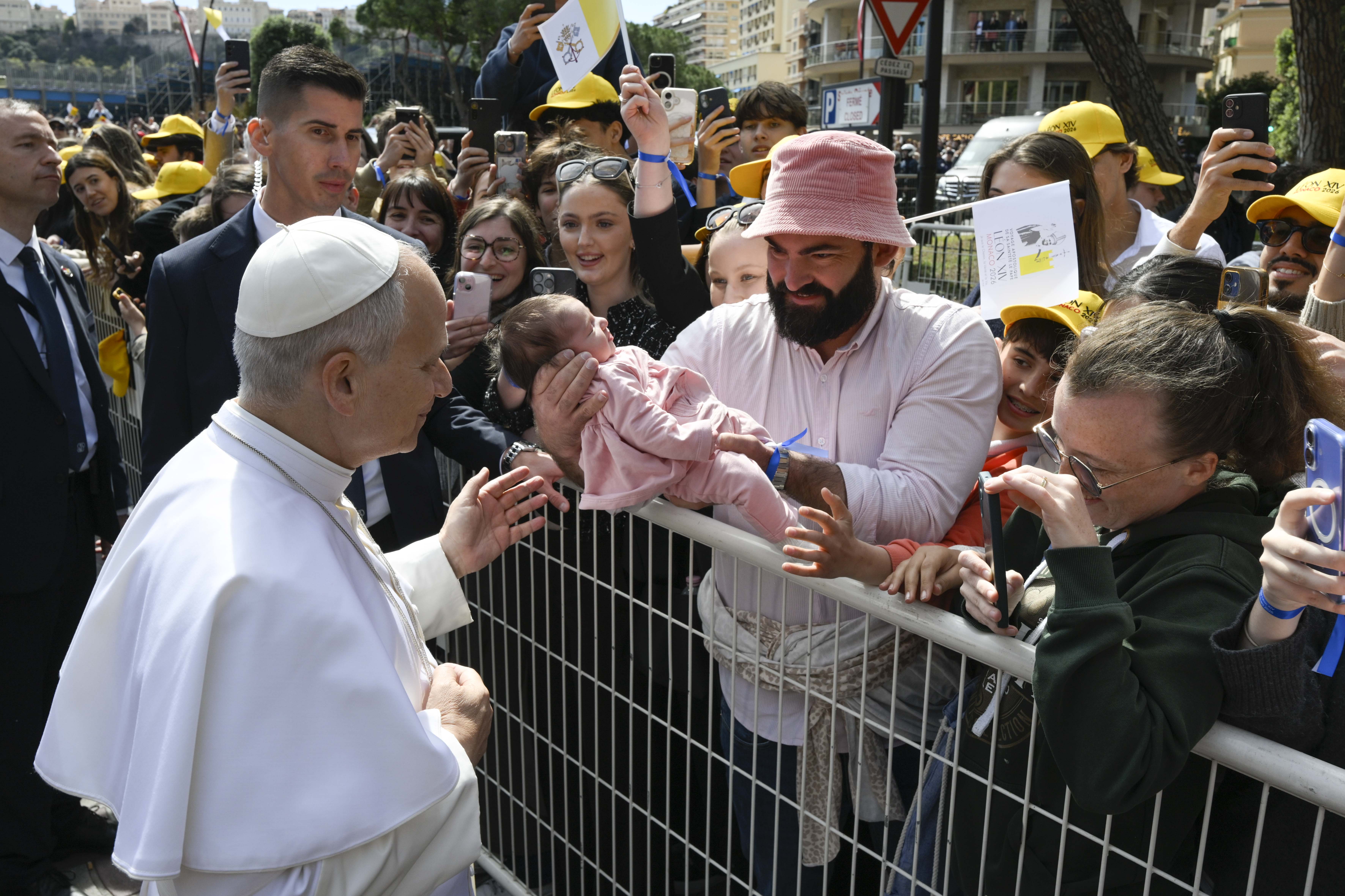 Pope Leo XIV greets a baby on the streets of Monaco, Saturday, March 28, 2026 | Credit: Vatican Media