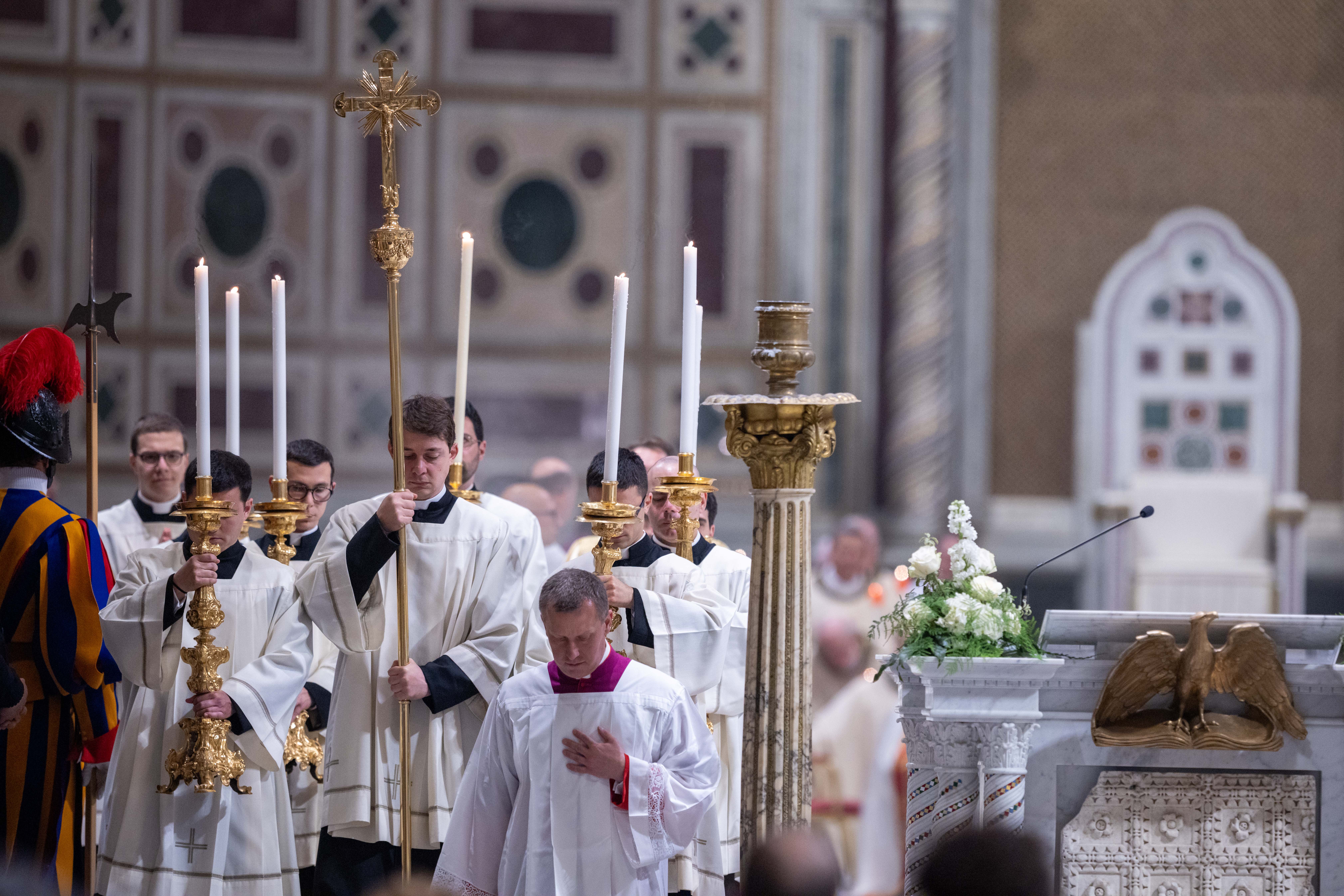 Acolytes process through the Basilica of St. John Lateran during the Mass of the Lord’s Supper, Thursday, April 2, 2026. | Credit: Daniel Ibáñez/EWTN News