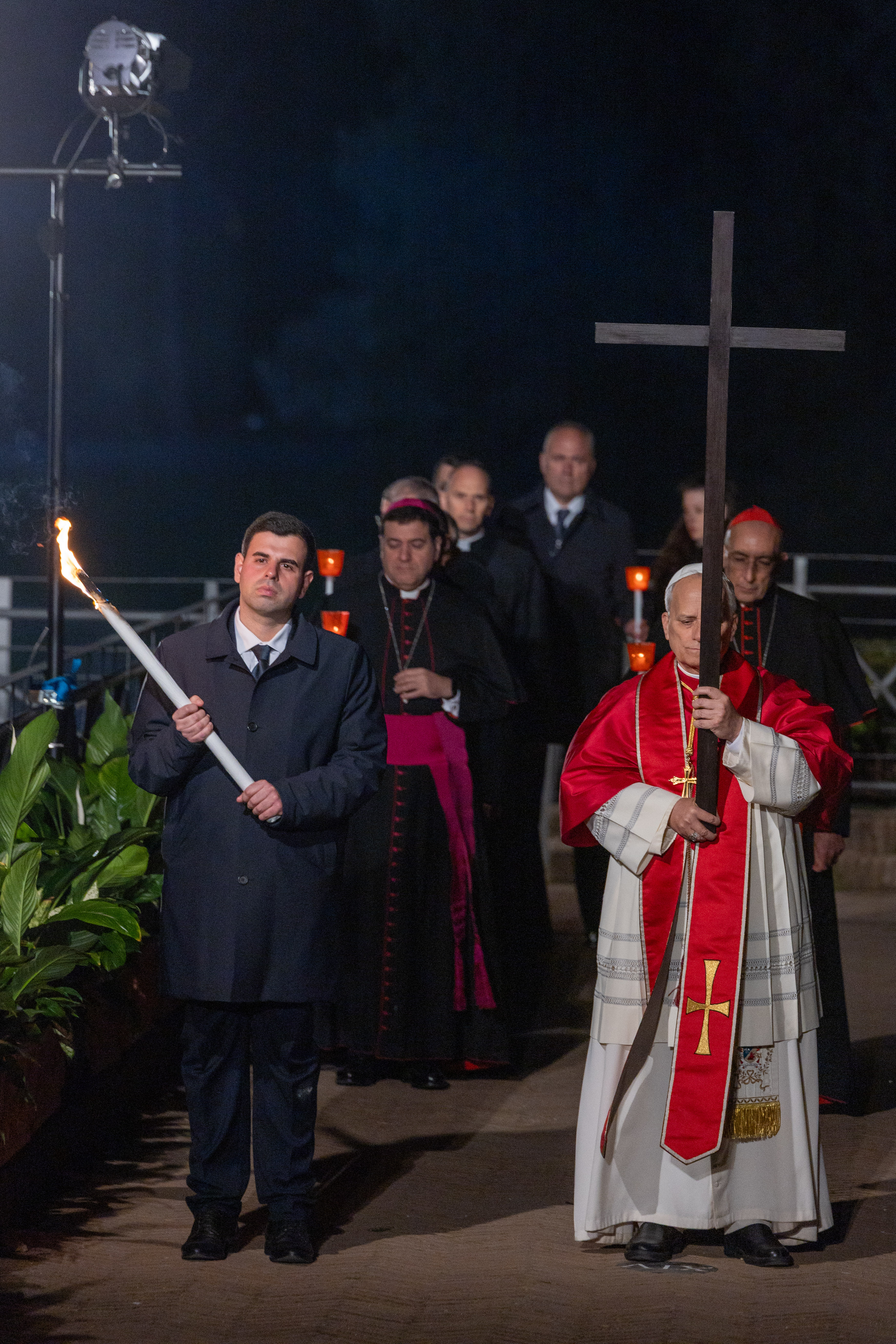 Pope Leo XIV carries the cross during the Via Crucis at the Colosseum in Rome, Friday, April 3, 2026. | Credit: Daniel Ibáñez/EWTN News