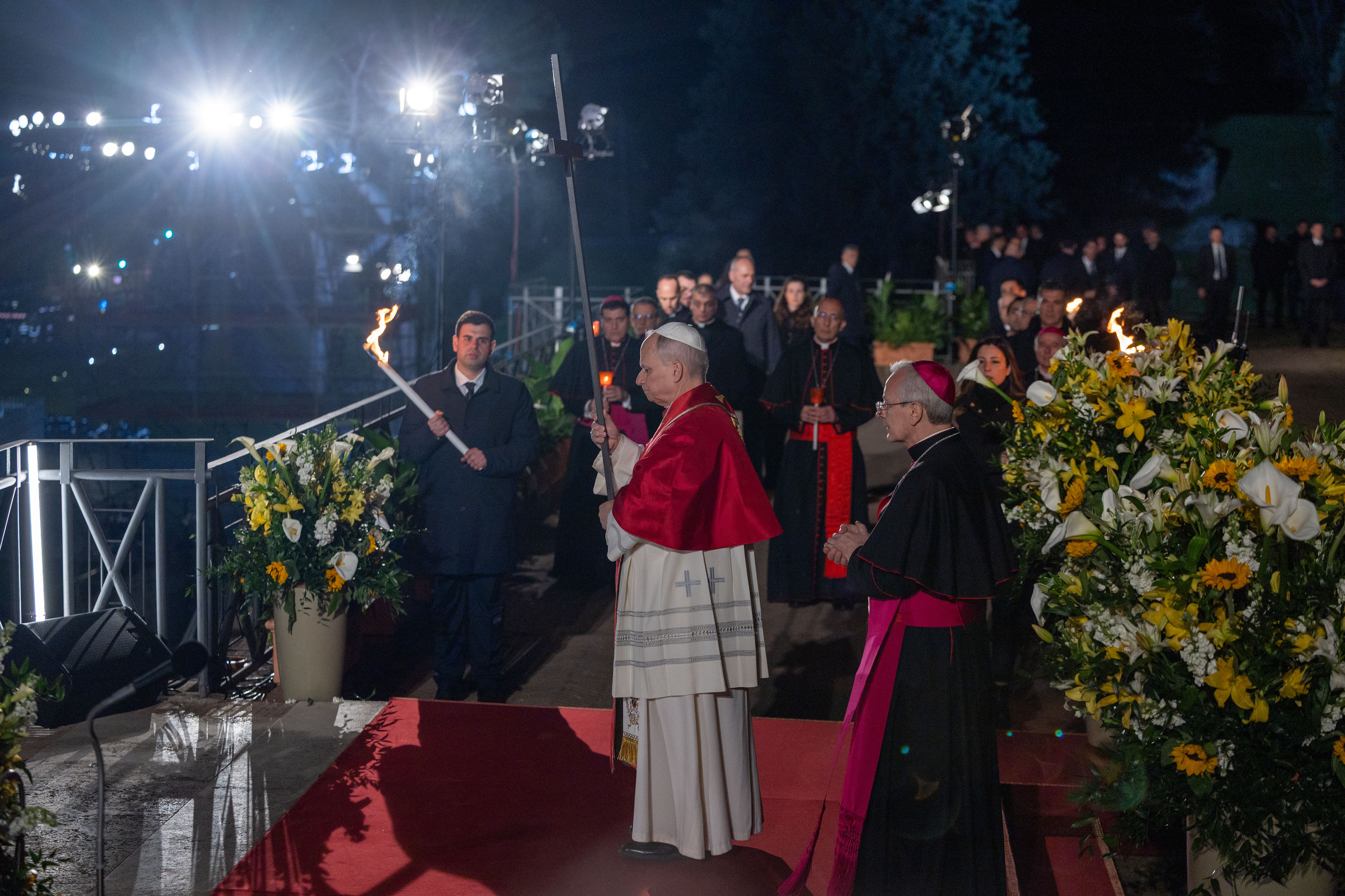 Pope Leo XIV carries the cross during the Via Crucis at the Colosseum in Rome, Friday, April 3, 2026. | Credit: Daniel Ibáñez/EWTN News