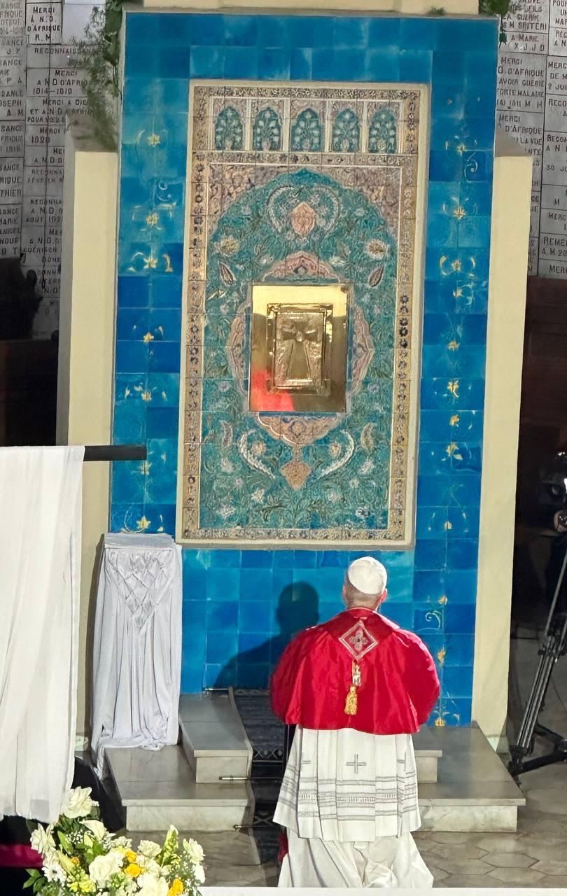 Pope Leo XIV prays in front of a tabernacle in the Basilica of Our Lady of Africa in Algiers, Algeria, on April 13, 2026, the first day of an apostolic journey to four countries in Africa. | Credit: AIGAV Pool