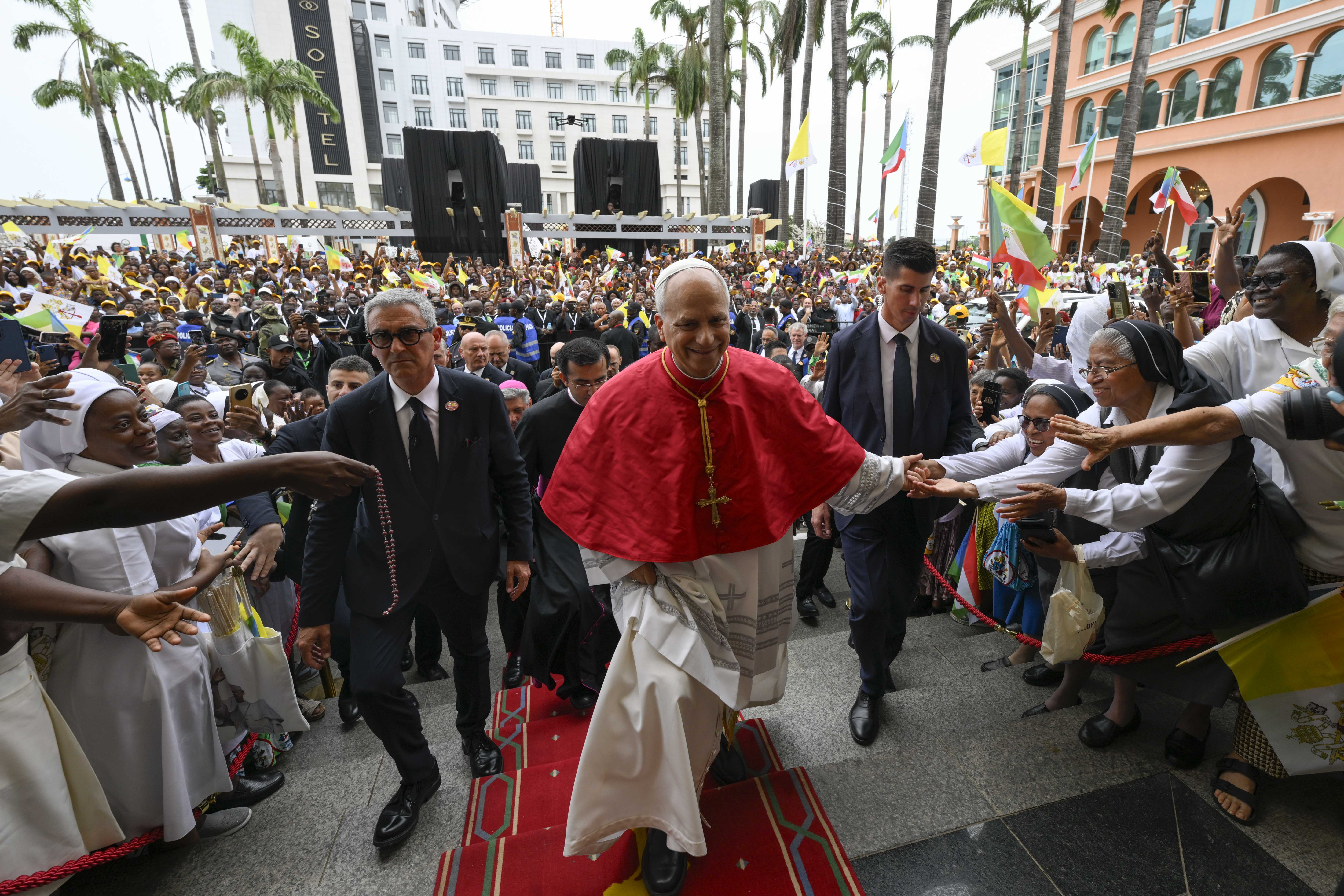 Pope Leo XIV greets crowds as he walks through Malabo in Equatorial Guinea on Tuesday, April 21, 2026. | Credit: Vatican Media