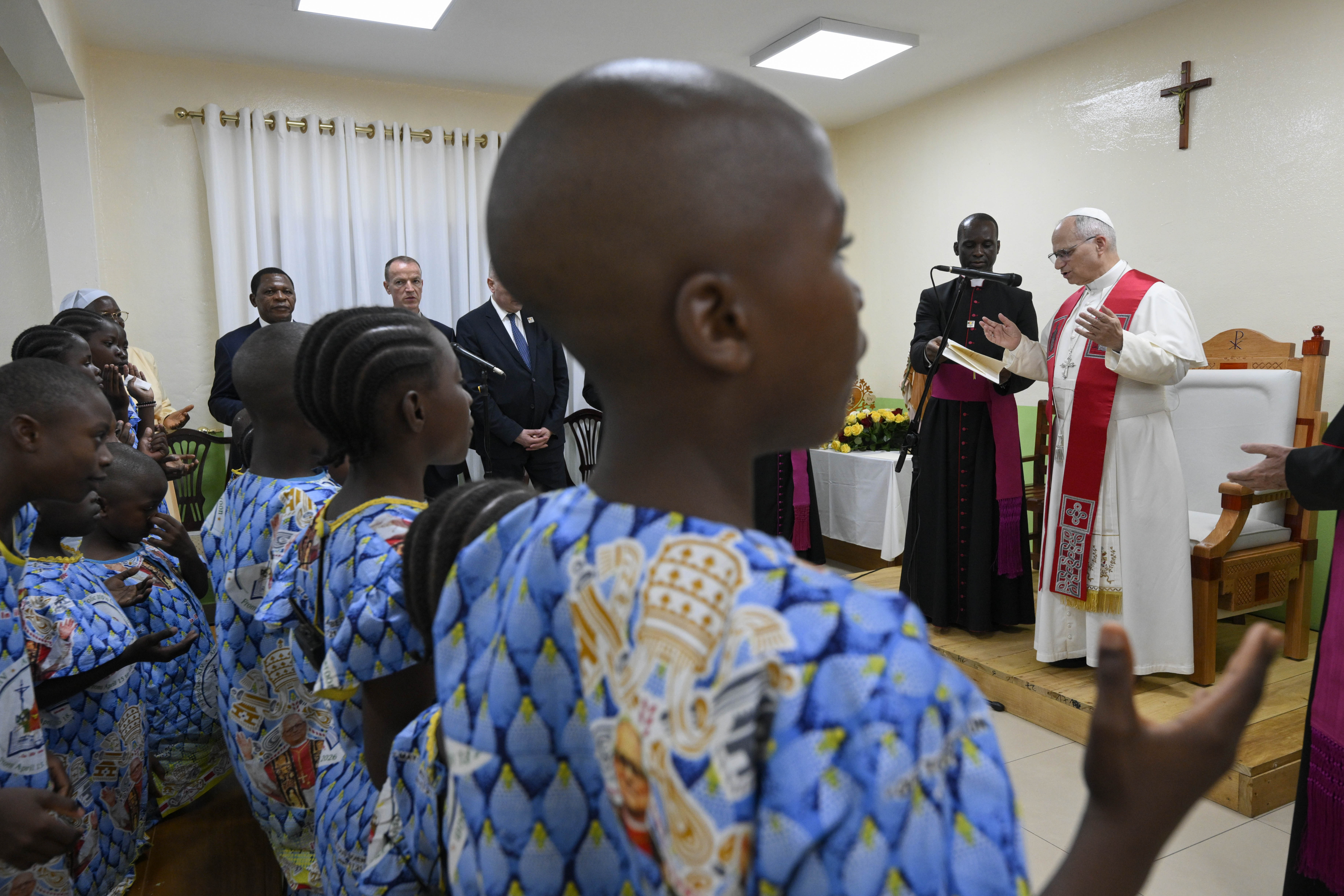 Children pray with Pope Leo XIV at the Ngul Zamba Orphanage in Yaoundé, Wednesday, April 15, 2026. | Credit: Vatican Media