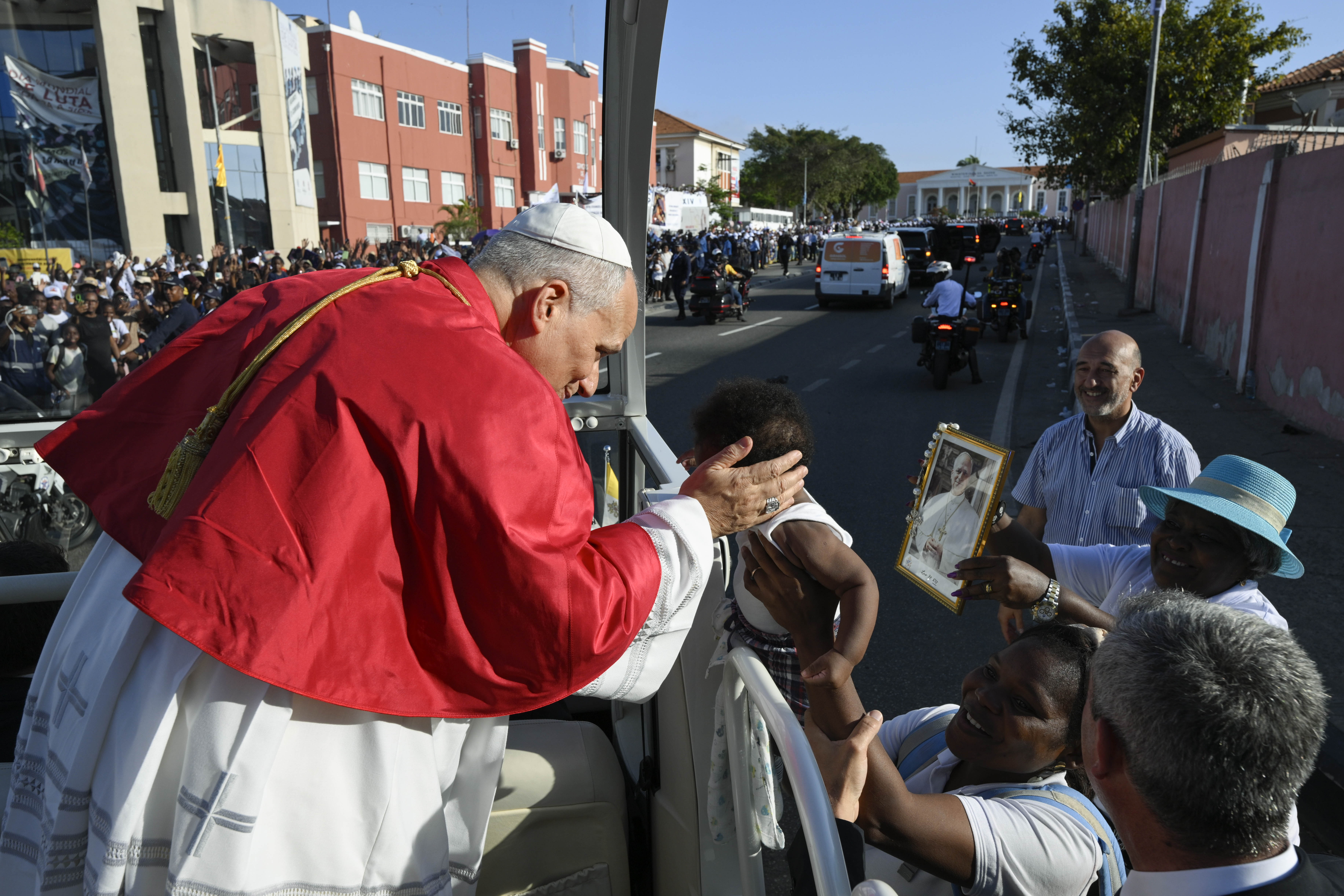 Pope Leo XIV greets a child in Luanda, Angola, Saturday, April 18, 2026. | Credit: Vatican Media