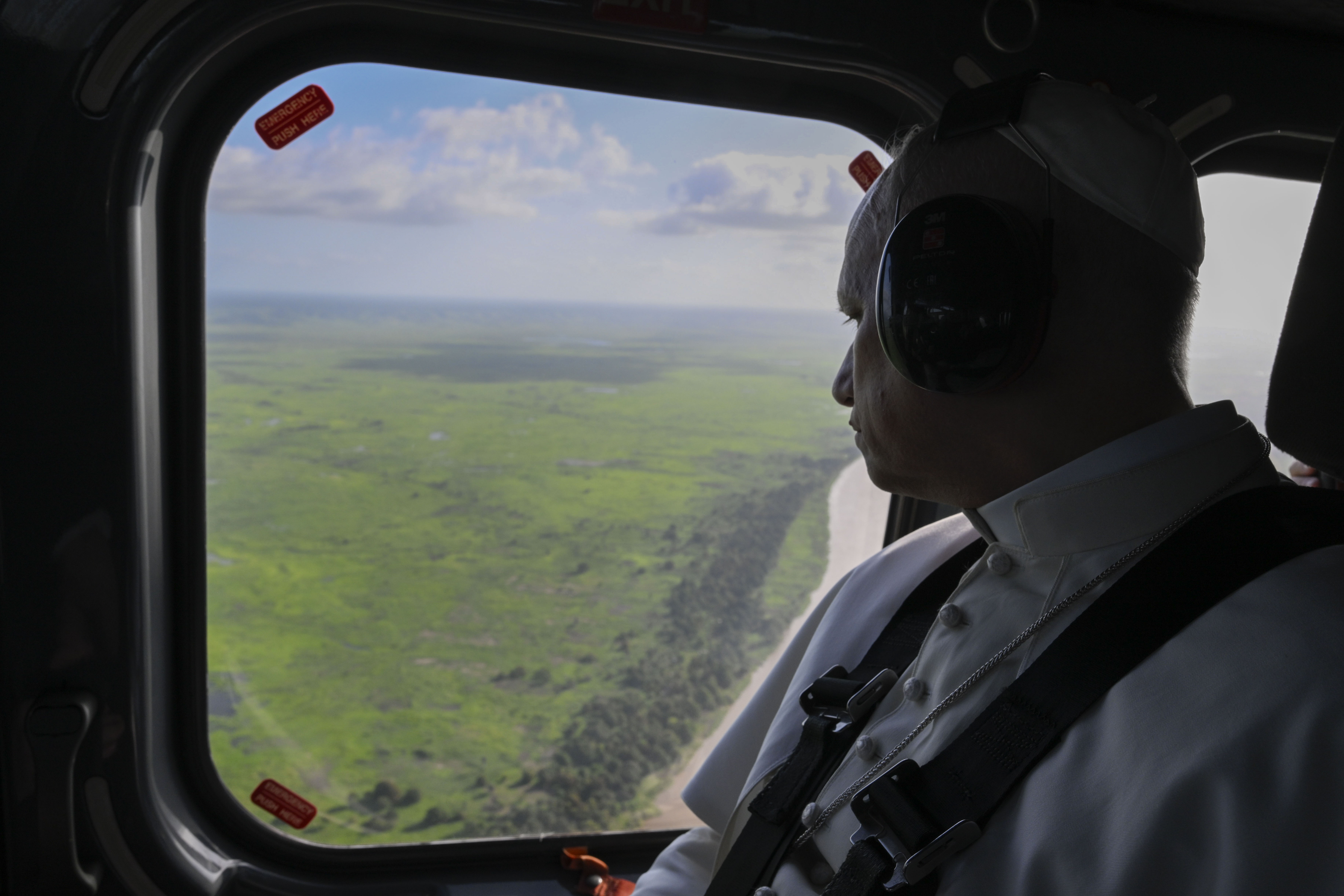 Pope Leo XIV looks out the window during his ride to the Marian shrine of Mama Muxima in Kimbaxe, Angola, on April 19, 2026. | Credit: Vatican Media