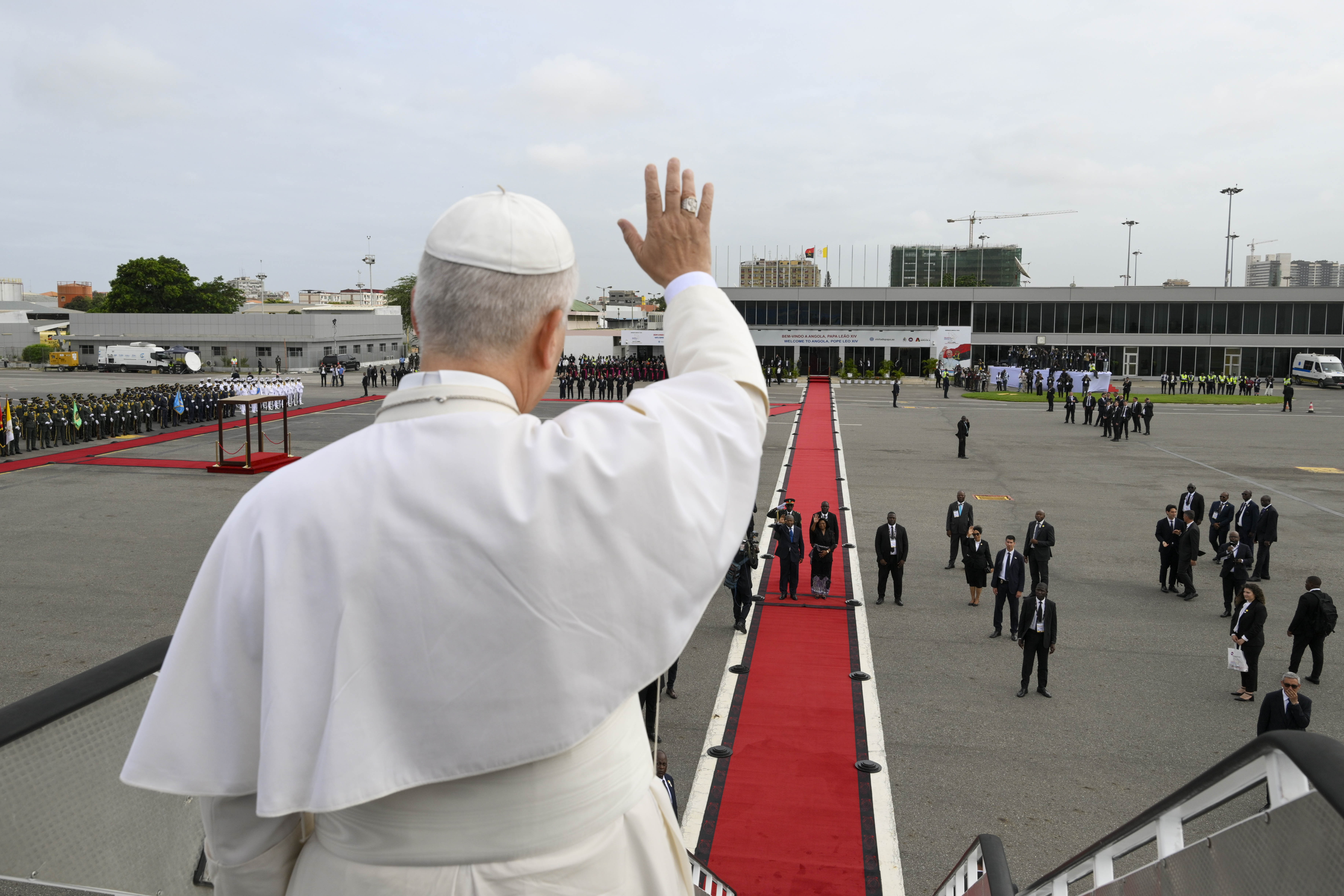 Pope Leo XIV waves as he departs Angola at Quatro de Fevereiro International Airport on Tuesday, April 21, 2026. | Credit: Vatican Media