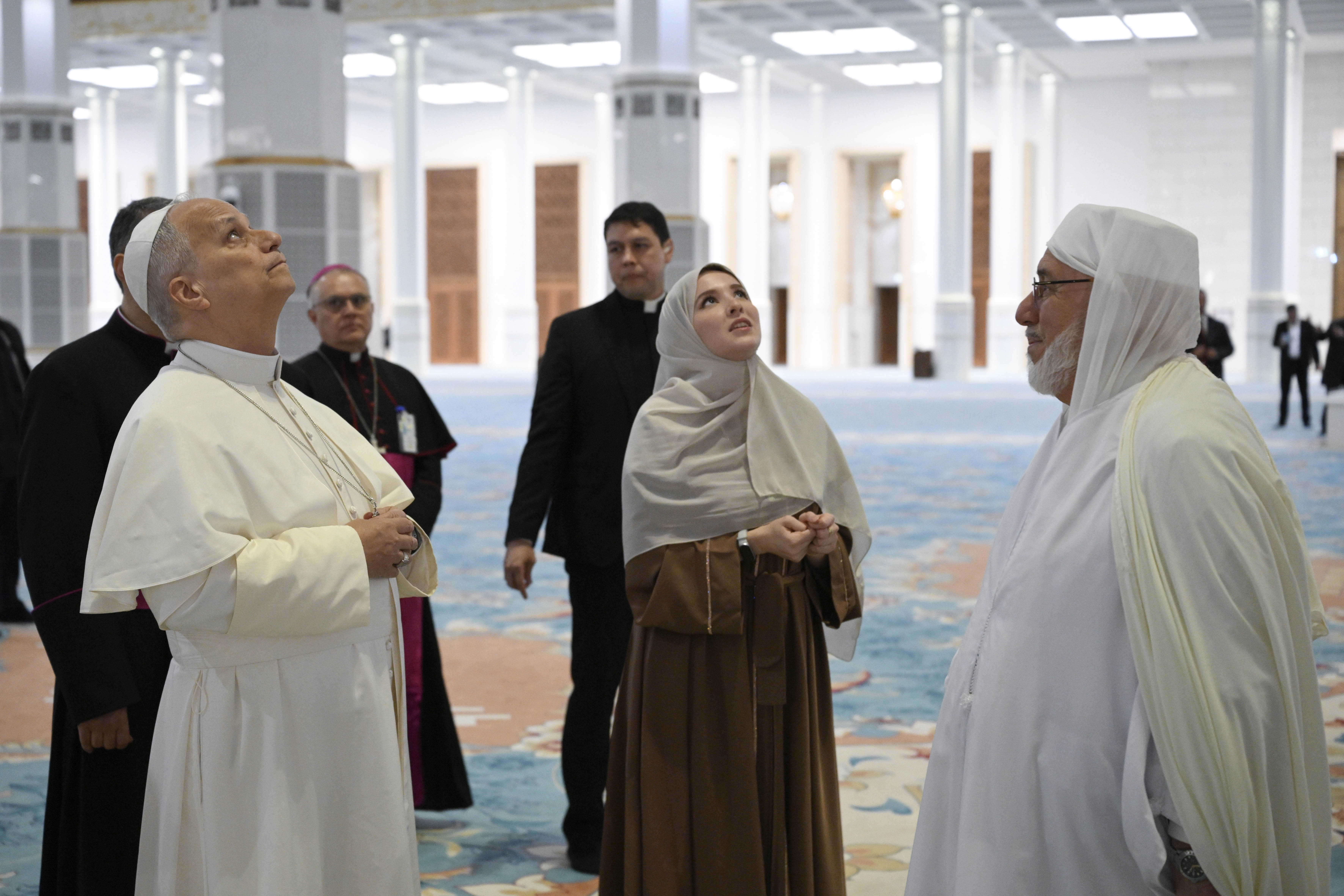 Pope Leo XIV stands with guests at the Great Mosque of Algiers, Monday, April 13, 2026. | Credit: Vatican Media